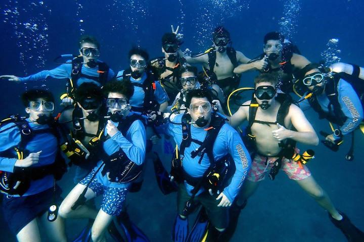 a group of people posing for the camera