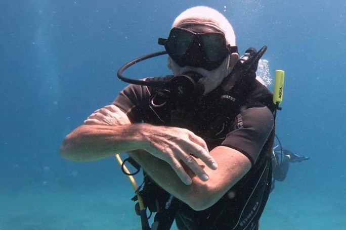 a person swimming in a body of water