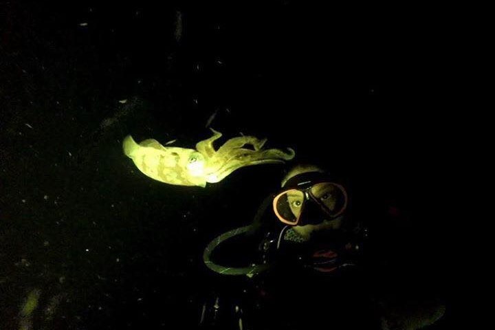 a person taking a selfie in a dark room