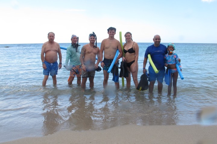 a group of people on a beach