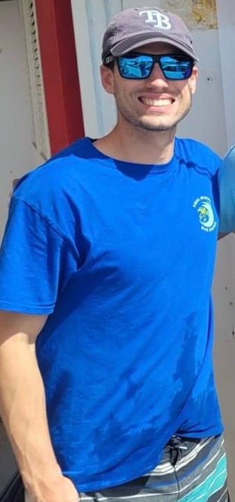 a man wearing a blue shirt