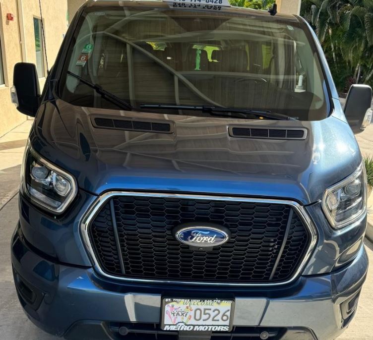 a blue car parked in a parking lot